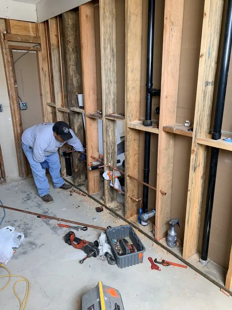 Commercial rough-in plumbing for Water Heater Replacement in Downtown Watertown